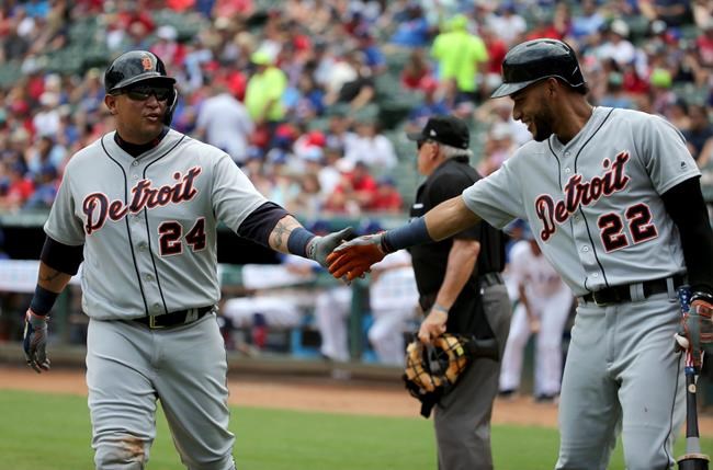 Detroit Tigers' Miguel Cabrera (24) is congratulated by Victor Reyes (22) after Cabrera scored against the Texas Rangers during the fourth inning of a baseball game Sunday, Aug 4, 2019, in Arlington, Texas. (AP Photo/Michael Ainsworth)