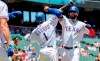 Texas Rangers' Nomar Mazara, right, is congratulated by Elvis Andrus (1) after hitting a two-run home run that scored Andrus off of Oakland Athletics starting pitcher Paul Blackburn during the third inning of the first baseball game of a doubleheader Saturday, June 8, 2019, in Arlington, Texas. (AP Photo/Jeffrey McWhorter)