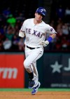 Texas Rangers' Nick Solak runs the bases after hitting a two-run home run against the Tampa Bay Rays during the fourth inning of a baseball game in Arlington, Texas, Thursday, Sept. 12, 2019. (AP Photo/Tony Gutierrez)