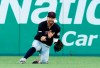 Cleveland Indians right fielder Tyler Naquin makes a sliding catch on a flyout by Texas Rangers' Delino DeShields in the third inning of baseball game in Arlington, Texas, Monday, June 17, 2019. (AP Photo/Tony Gutierrez)