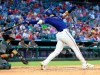 Texas Rangers Joey Gallo (13) follows through on a solo home run in the fourth inning of a baseball game against the Arizona Diamondbacks Tuesday, July 16, 2019 in Arlington, Texas. (AP Photo/Richard W. Rodriguez)