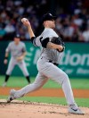 New York Yankees starting pitcher James Paxton throws to the Texas Rangers in the first inning of a baseball game in Arlington, Texas, Friday, Sept. 27, 2019. Paxton did not return to throw in the second inning. (AP Photo/Tony Gutierrez)