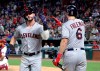 Cleveland Indians' Tyler Naquin, left, celebrates with Mike Freeman (6) after Naquin hit a solo home run off Texas Rangers' Drew Smyly during the seventh inning of a baseball game in Arlington, Texas, Tuesday, June 18, 2019. (AP Photo/Tony Gutierrez)