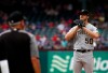 Pittsburgh Pirates starting pitcher Jameson Taillon reacts as manager Clint Hurdle walks to the mound to relieve him against the Texas Rangers during the seventh inning of a baseball game Wednesday May 1, 2019, in Arlington, Texas. (AP Photo/Mike Stone)