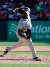 New York Yankees relief pitcher Aroldis Chapman throws to the Texas Rangers in the eighth inning of a baseball game in Arlington, Texas, Sunday, Sept. 29, 2019. (AP Photo/Tony Gutierrez)