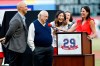 Former player Raul Ibanez, left, and former Los Angeles Dodgers manager Tommy Lasorda, center, responds to a question from Texas Rangers field reporter Emily Jones, right, during a jersey retirement ceremony for Adrian Beltre before the second baseball game of a doubleheader against the Oakland Athletics in Arlington, Texas, Saturday, June 8, 2019. (AP Photo/Roger Steinman)