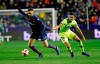 Levante defender Borja Mayora, left, duels for the ball with Barcelona's Chumi during the la Copa del Rey round of 16 first leg soccer match between Levante and Barcelona at the Ciutat de Valencia stadium in Valencia, Spain, Thursday Jan. 10, 2019. (AP Photo/Alberto Saiz)