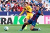 Barcelona's Antoine Griezmann kicks the ball past Levante's Ruben Vezo during the Spanish La Liga soccer match in Valencia, Spain, Nov.2 , 2019. (AP Photo/Alberto Saiz)