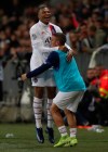 PSG's Kylian Mbappe celebrates his goal with PSG's PSG's Marco Verratti during the French League One soccer match between Nice and Paris Saint Germain in Allianz Riviera stadium in Nice, southern France, Friday, Oct.18, 2019. (AP Photo/Daniel Cole)