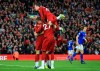 Liverpool players celebrate Liverpool's James Milner wining goal during English Premier League soccer match between Liverpool and Leicester City in Anfield stadium in Liverpool, England, Saturday, Oct. 5, 2019. (AP Photo/Jon Super)