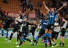 Inter Milan's players celebrate at the end of a Serie A soccer match between AC Milan and Inter Milan, at the San Siro stadium in Milan, Italy, Saturday, Sept.21, 2019. (AP Photo/Luca Bruno)