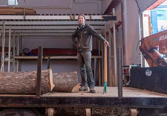 SASHA SEFTER / WINNIPEG FREE PRESSOwner of WPG Timber Co. Mike McGarry prepares to unload diseased ash trees in his Winnipeg warehouse.
