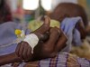 The arm of Mihag Gedi Farah, a seven-month-old child with a weight of 3.4kg, is held by his motherl in a field hospital of the International Rescue Committee, IRC, in the town of Dadaab, Kenya, Tuesday, July 26, 2011. The U.N. will airlift emergency rations this week to parts of drought-ravaged Somalia that militants banned it from more than two years ago, in a crisis intervention to keep hungry refugees from dying along what an official calls the 