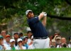Shane Lowry, of Ireland, hits on the fourth hole during the first round for the Masters golf tournament Thursday, April 11, 2019, in Augusta, Ga. (AP Photo/Matt Slocum)