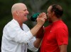 Tiger Woods reacts with his caddie Joe LaCava as he wins the Masters golf tournament Sunday, April 14, 2019, in Augusta, Ga. (AP Photo/Chris Carlson)
