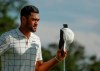 Tony Finau reacts after finishing on the 18th hole during the third round for the Masters golf tournament Saturday, April 13, 2019, in Augusta, Ga. (AP Photo/Chris Carlson)