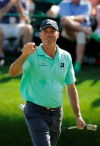 Matt Kuchar reacts to his birdie on the 16th hole during the third round for the Masters golf tournament Saturday, April 13, 2019, in Augusta, Ga. (AP Photo/Charlie Riedel)