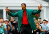 Tiger Woods smiles as he wears his green jacket after winning the Masters golf tournament Sunday, April 14, 2019, in Augusta, Ga. (AP Photo/Matt Slocum)