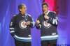 John Woods / Winnipeg Free Press
Hosts Lorne Cardinal (left) and Kyle Nobess donned Jets jerseys at the 2011 Aboriginal Peoples Choice Music Awards on Friday.