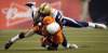 Darryl Dyck / The Canadian Press
The B.C. Lions' Kierrie Johnson (bottom) is tackled by the Winnipeg Blue Bombers' Johnny Sears after making a reception that was called back due to penalties against both teams during the first half in Vancouver on Friday.