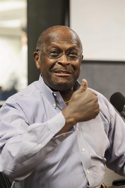 Former Republican Presidential candidate Herman Cain is introduced as the replacement radio host for Neal Boortz during his morning show at News-Talk WSB AM750 in Atlanta on Monday, June 4, 2012. Cain will replace Boortz full-time following inauguration day, Jan. 21, 2013. (AP Photo/Paul Abell)