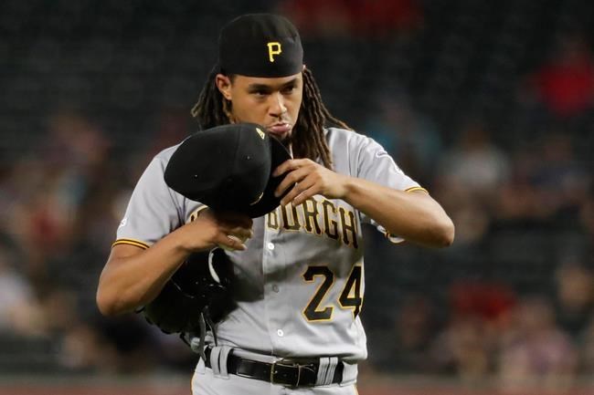 Pittsburgh Pirates starting pitcher Chris Archer walks off the mound after giving up tree run against the Arizona Diamondbacks during the top of the first inning of a baseball game in Phoenix, Wednesday, May 15, 2019. (AP Photo/Matt York)