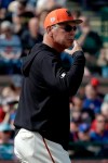 San Francisco Giants manager Bruce Bochy takes starting pitcher Madison Bumgarner out of a spring baseball game against the Chicago Cubs during the second inning in Scottsdale, Ariz., Sunday, Feb. 24, 2019. (AP Photo/Chris Carlson)