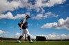 Seattle Mariners' Ichiro Suzuki walks onto a practice field during baseball spring training Saturday, Feb. 16, 2019, in Peoria, Ariz. (AP Photo/Charlie Riedel)