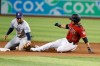 San Diego Padres' Luis Urias, left, tags out Arizona Diamondbacks' Edurado Escobar at second base during the ninth inning of a baseball game Sunday, Sept. 29, 2019, in Phoenix. (AP Photo/Darryl Webb)