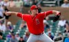 Los Angeles Angels starting pitcher Matt Harvey throws against the Colorado Rockies in the first inning of a spring training baseball game Wednesday, March 6, 2019, in Scottsdale, Ariz. (AP Photo/Elaine Thompson)