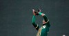 Rain falls as Oakland Athletics second baseman Jurickson Profar snags a pop-up from Colorado Rockies' Nolan Arenado in the fourth inning of a spring training baseball game Monday, March 11, 2019, in Scottsdale, Ariz. (AP Photo/Elaine Thompson)