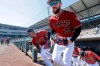 Arizona Diamondbacks' Steven Souza Jr. (28) and Eduardo Escobar (5) lead players out of the dugout before a spring training baseball game against the San Francisco Giants Thursday, March 14, 2019, in Scottsdale, Ariz. (AP Photo/Elaine Thompson)