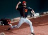San Francisco Giants pitcher Kieran Lovegrove works out during a baseball spring training practice, Wednesday, Feb. 13, 2019, in Scottsdale, Ariz. (AP Photo/Matt York)