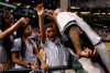 New York Yankees starting pitcher C.C. Sabathia greets his children after throwing his 3,000th career strikeout, during the second inning of a baseball game against the Arizona Diamondbacks on Tuesday, April 30, 2019, in Phoenix. (AP Photo/Matt York)