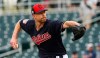 Cleveland Indians starting pitcher Corey Kluber throws a pitch against the Cincinnati Reds during the first inning of a spring training baseball game Monday, March 11, 2019, in Goodyear, Ariz. (AP Photo/Ross D. Franklin)