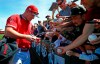 Los Angeles Angels' Mike Trout signs autographs prior to a spring training baseball game against the Kansas City Royals Friday, March 1, 2019, in Tempe, Ariz. (AP Photo/Ross D. Franklin)