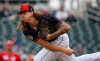Cleveland Indians pitcher Mike Clevinger throws a pitch during the fourth inning of a spring training baseball game against the Cincinnati Reds Monday, March 11, 2019, in Goodyear, Ariz. (AP Photo/Ross D. Franklin)