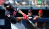 Cleveland Indians' Hanley Ramirez hits a pop fly during the second inning of a spring training baseball game against the San Diego Padres' Monday, March 4, 2019, in Peoria, Ariz. (AP Photo/Ross D. Franklin)
