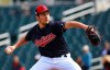 FILE - In this Feb. 25, 2019 file photo, Cleveland Indians starting pitcher Trevor Bauer throws against the Texas Rangers during the first inning of a spring training baseball game in Goodyear, Ariz. Presumably, they will all be ready to pitch the first week of the season, establishing the order of Cleveland‚Äôs starting rotation is on hold for Indians manager Terry Francona with 19 days remaining before the season opener, March 28 at Minnesota. (AP Photo/Ross D. Franklin, File)
