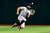 San Francisco Giants center fielder Kevin Pillar (1) makes the sliding catch for an out on a ball hit by Arizona Diamondbacks' Ildemaro Vargas in the first inning during a baseball game, Sunday, June 23, 2019, in Phoenix. (AP Photo/Rick Scuteri)