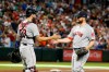 Boston Red Sox pitcher Ryan Brasier and Blake Swihart (23) celebrate after defeating the Arizona Diamondbacks 1-0 during a baseball game, Sunday, April 7, 2019, in Phoenix. (AP Photo/Rick Scuteri)