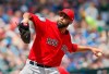 Boston Red Sox pitcher David Price pitches in the first inning of a spring training baseball game against the Chicago Cubs Tuesday, March 26, 2019, in Mesa, Ariz. (AP Photo/Sue Ogrocki)