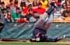 Cleveland Indians' JosÃ© Ramirez falls after hitting himself with a foul tip in the third inning of a spring training baseball game against the Chicago White Sox Sunday, March 24, 2019, in Glendale, Ariz. (AP Photo/Sue Ogrocki)