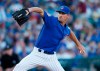 Chicago Cubs pitcher Cole Hamels throws during the first inning of a spring training baseball game against the Boston Red Sox on Monday, March 25, 2019, in Mesa, Ariz. (AP Photo/Sue Ogrocki)