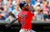Boston Red Sox's Dustin Pedroia flies out to right field in the second inning of a spring training baseball game against the Chicago Cubs Tuesday, March 26, 2019, in Mesa, Ariz. (AP Photo/Sue Ogrocki)