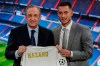 Belgium forward Eden Hazard, right, holds his new shirt with Real Madrid's President Florentino Perez during his official presentation after signing for Real Madrid at the Santiago Bernabeu stadium in Madrid, Spain, Thursday, June 13, 2019. Madrid announced last week that it had acquired the 28-year-old Belgian playmaker from Chelsea for a reported fee of around 100 million euros ($113 million) plus variables, making him the club's most expensive signing ever. (AP Photo/Manu Fernandez)