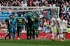 Betis players, center, celebrate after scoring their second goal against Real Madrid during a Spanish La Liga soccer match at the Santiago Bernabeu stadium in Madrid, Spain, Sunday, May 19, 2019. (AP Photo/Bernat Armangue)