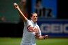 Former Baltimore Orioles pitcher Mike Mussina throws out the ceremonial first pitch before a baseball game between the Baltimore Orioles and the Cleveland Indians, Sunday, June 30, 2019, in Baltimore. (AP Photo/Nick Wass)