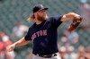 Boston Red Sox starting pitcher Andrew Cashner delivers to a Baltimore Orioles batter during the first inning of a baseball game, Sunday, July 21, 2019, in Baltimore. (AP Photo/Julio Cortez)