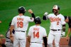 Baltimore Orioles' Jonathan Villar (2) celebrates his grand slam with Chris Davis (19) and Rio Ruiz (14) during the second inning of a baseball game against the Boston Red Sox, Monday, May 6, 2019, in Baltimore. (AP Photo/Nick Wass)
